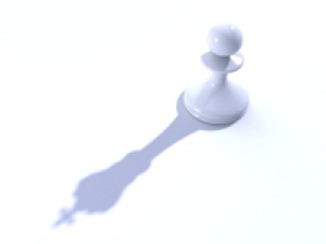 Chess pawn with king's shadow